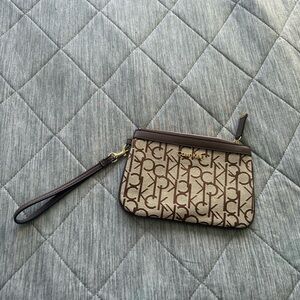 “CK” Calvin Klein Monogrammed Brown Detachable Wristlet